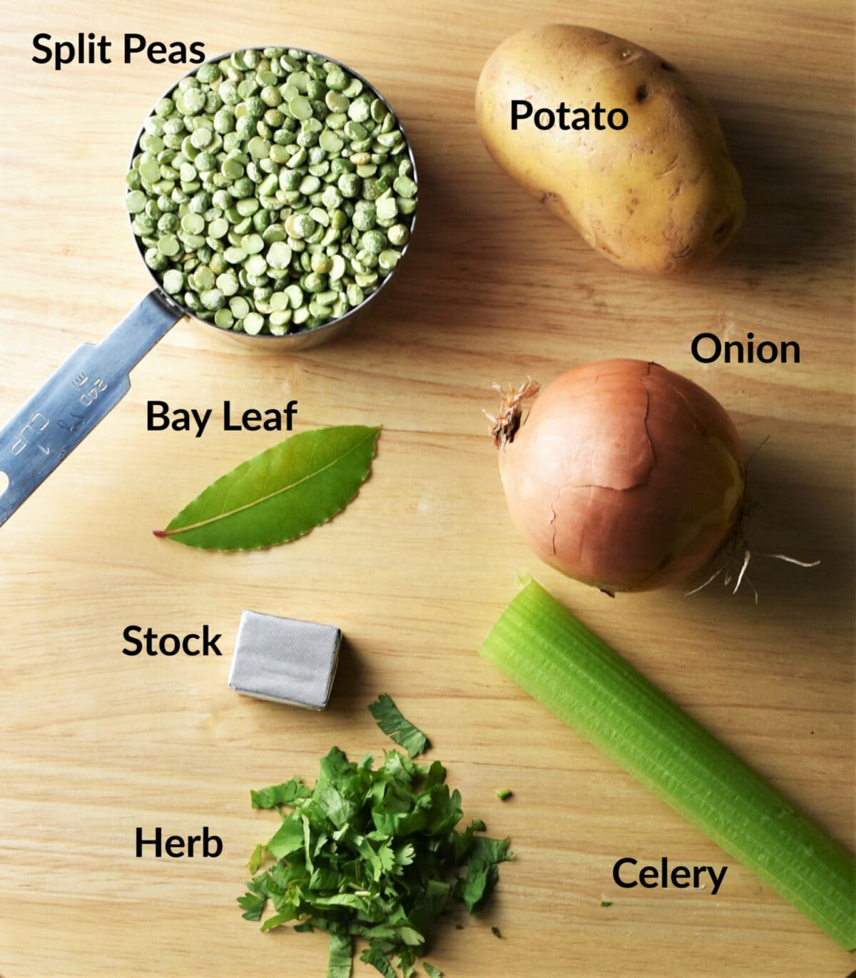 Split green peas, bay leaf, stock cube, chopped herbs, celery, onion and potato.