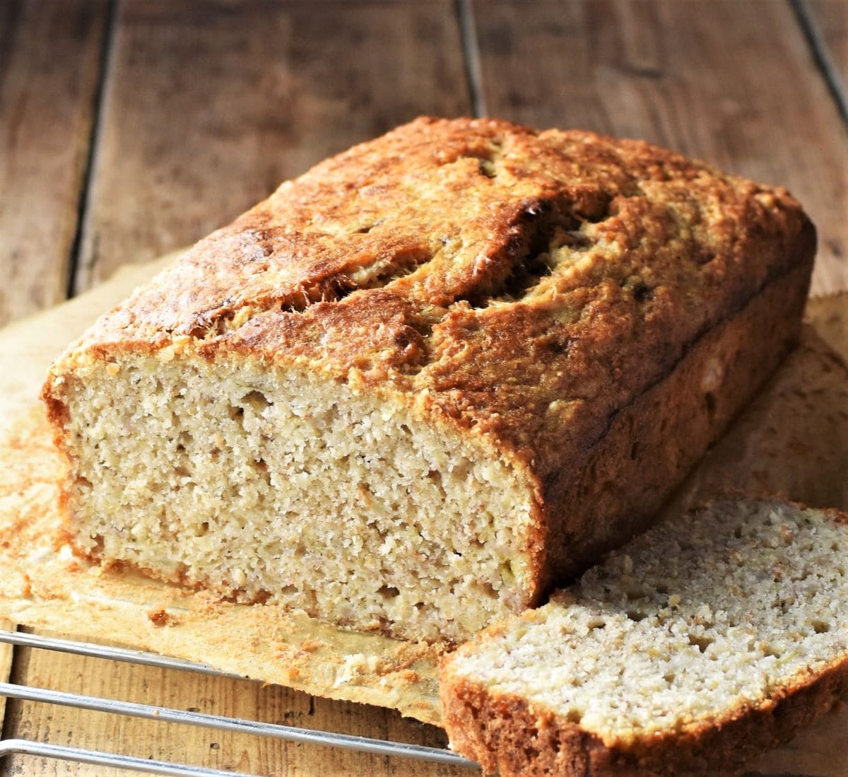 Side view of banana bread on top of rack.