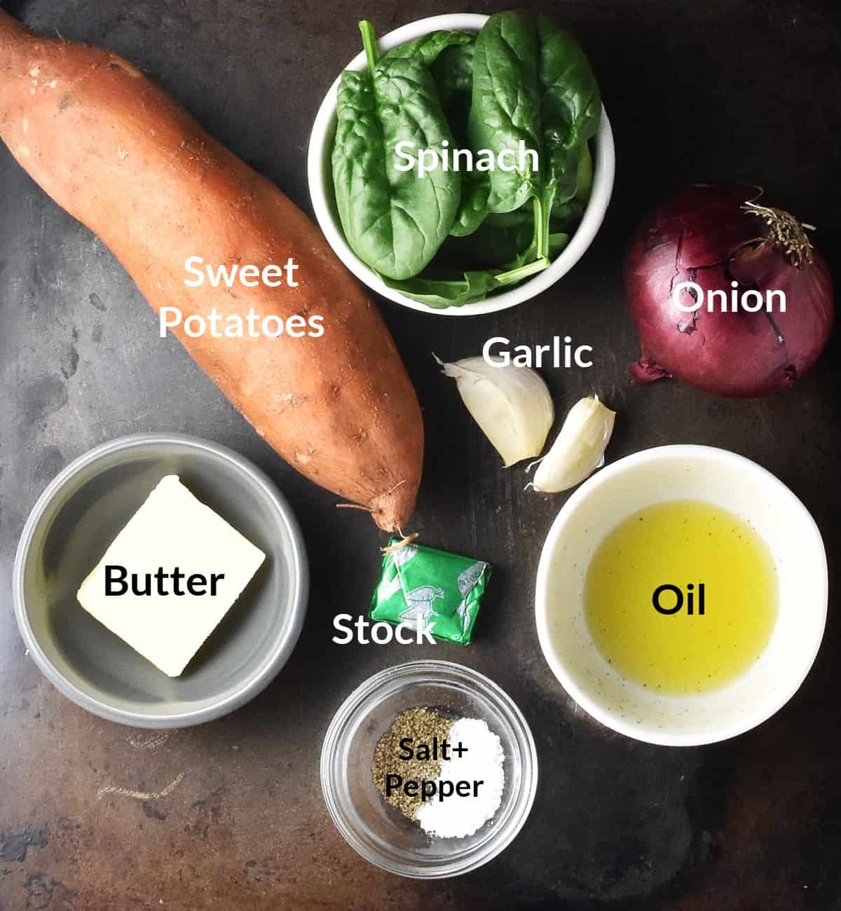 Top down view of roasted sweet potato soup ingredients in individual small dishes.