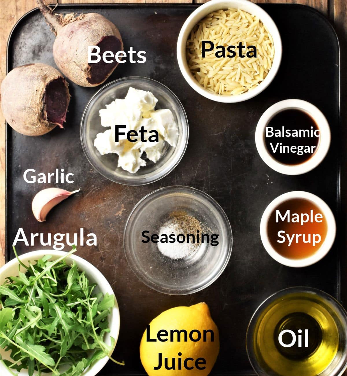 Ingredients for making beet and feta salad in individual dishes.