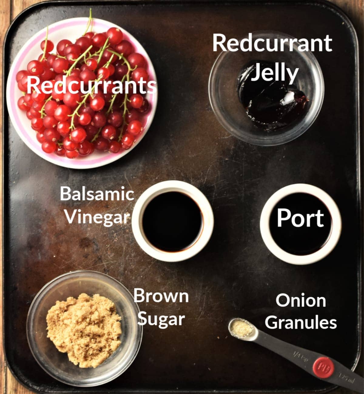 Redcurrant sauce ingredients in individual dishes.