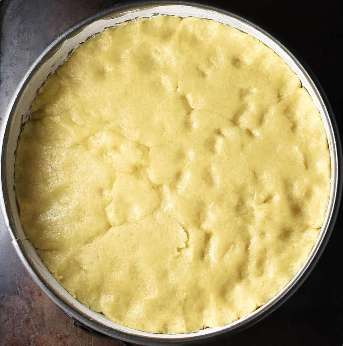 Pastry layer in bottom of cake pan.