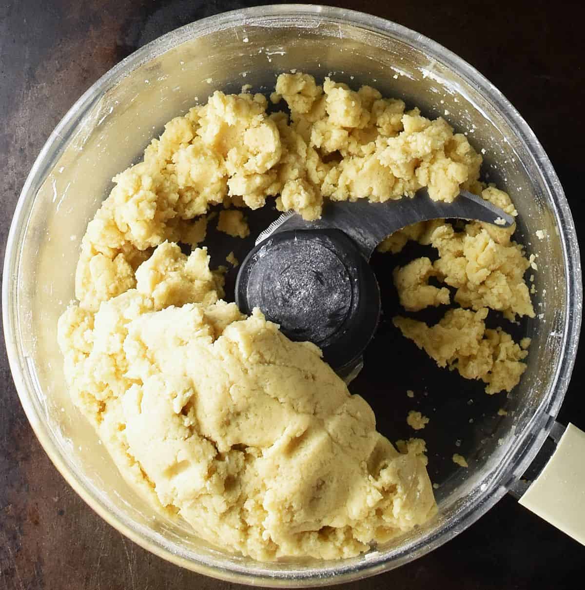 Making dough in food processor bowl.