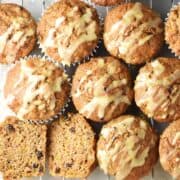 Top down view of cluster of butternut squash muffins with orange drizzle.