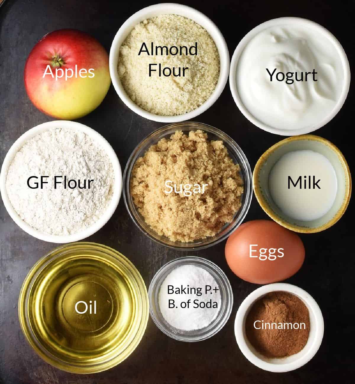 Top down view of ingredients for gluten free apple muffin in individual dishes.