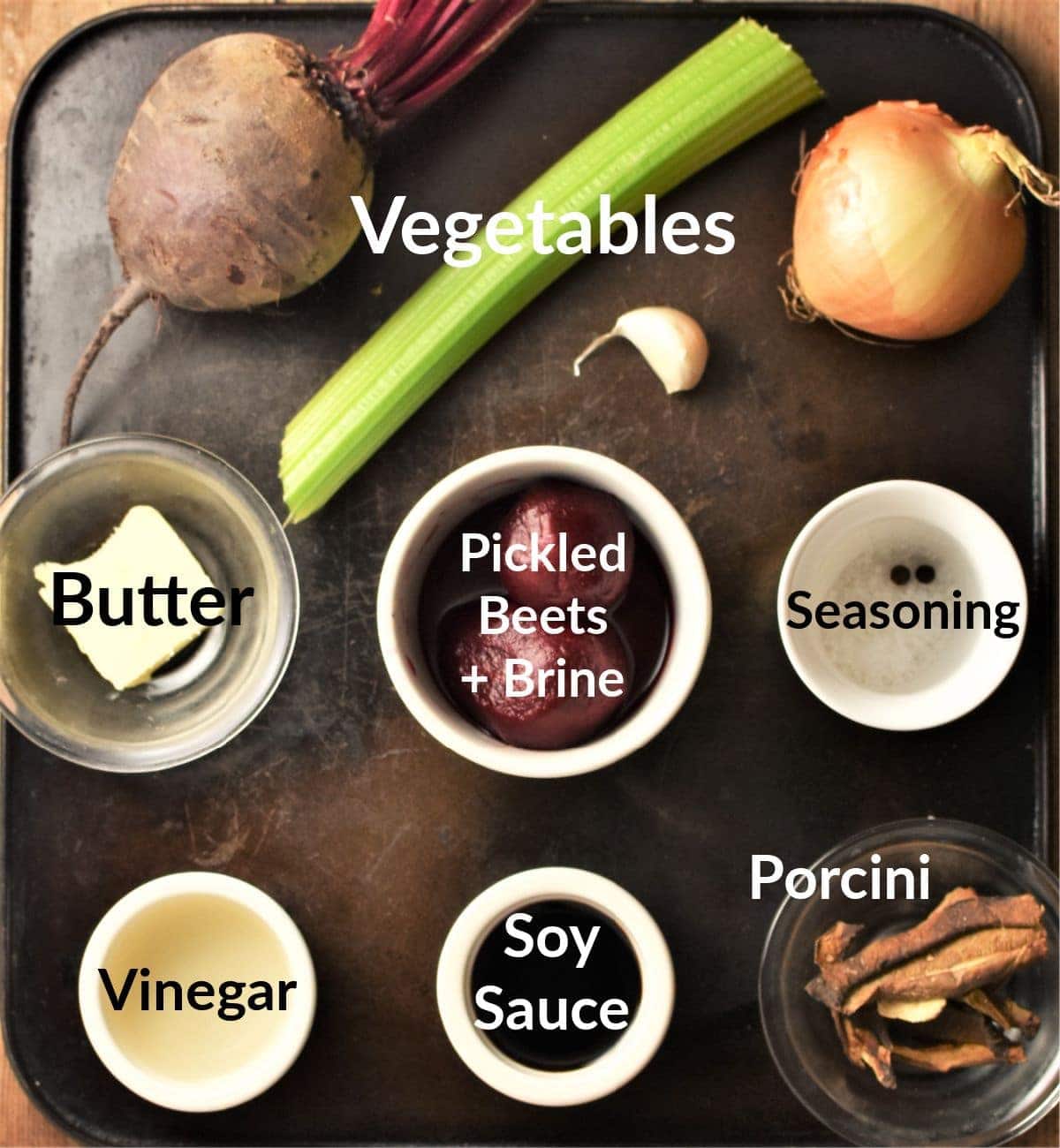 Polish borscht soup ingredients in individual dishes.