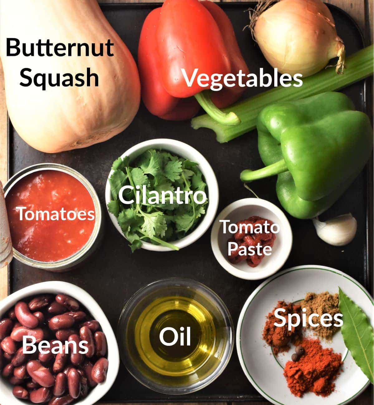 Butternut squash chili ingredients in individual dishes.