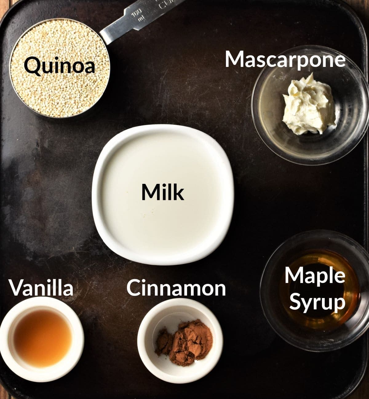 Quinoa pudding ingredients in individual dishes.