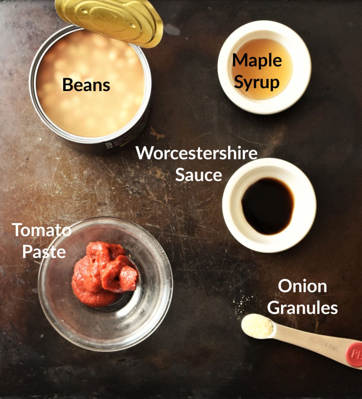 Baked beans ingredients in separate dishes.