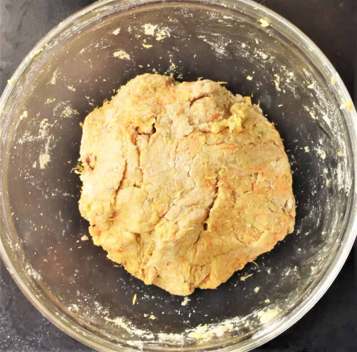 Carrot scones dough in mixing bowl.