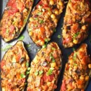 Top down view of vegan stuffed eggplant halves.