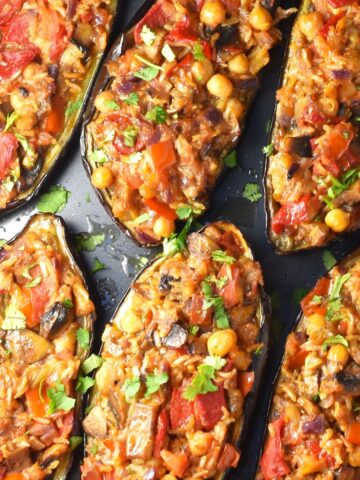 Top down view of vegan stuffed eggplant halves.