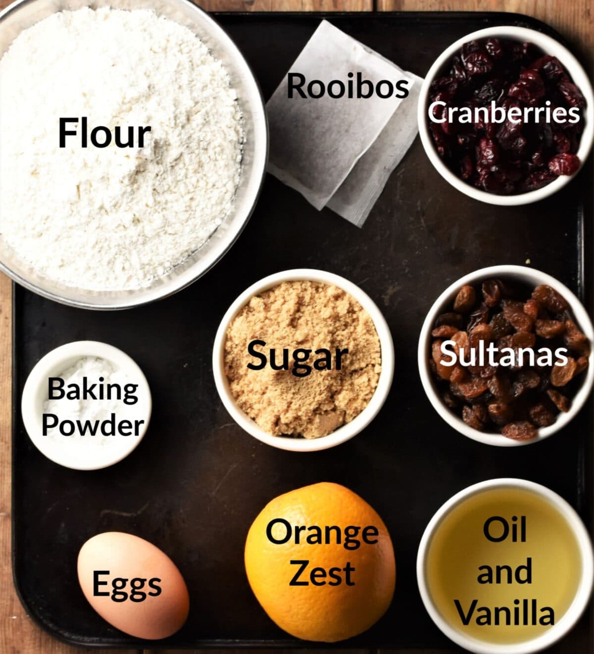 Tea cake ingredients in individual dishes.