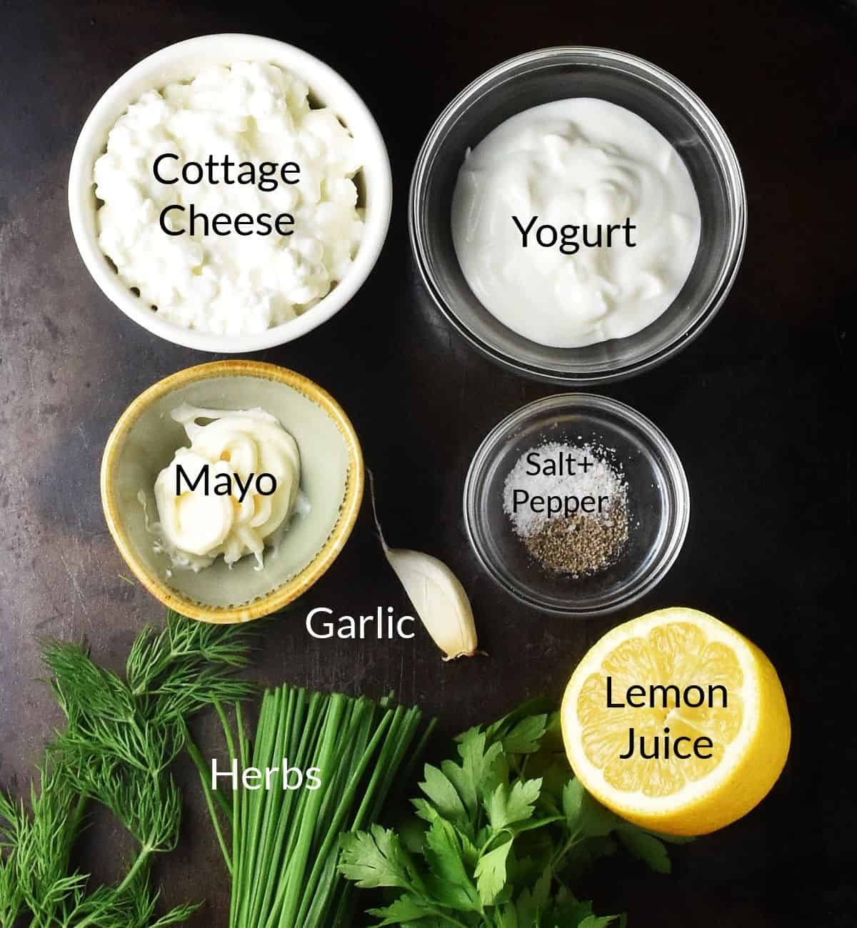 Top down view of cottage cheese ranch dressing ingredients in individual dishes.