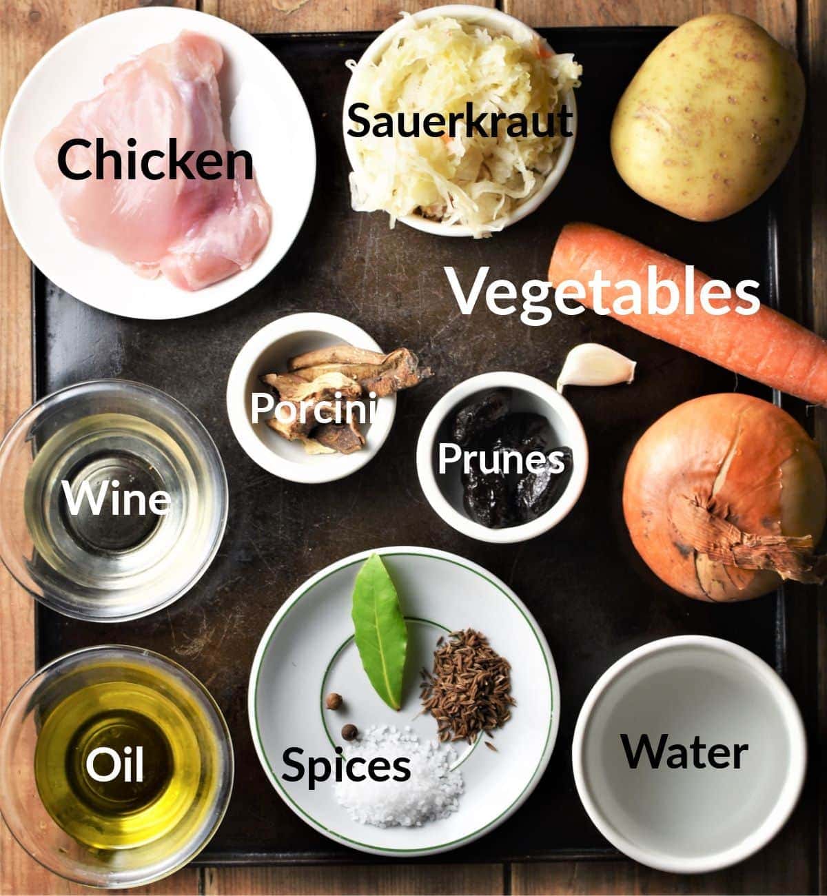 Sauerkraut casserole ingredients in individual dishes.