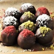 Side view of chestnut truffles on top of parchment.