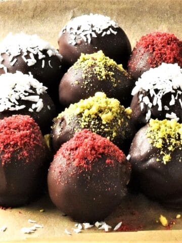 Side view of chestnut truffles on top of parchment.