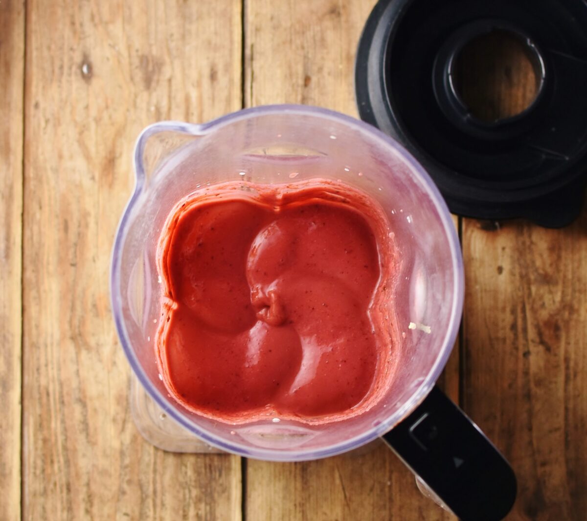 Raspberry smoothie in blender.