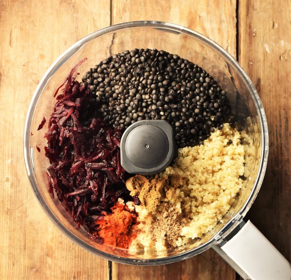 Grated beetroot, quinoa, lentils and spices in blender.