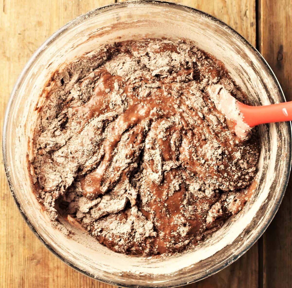 Chocolate cake batter with some flour not quite mixed in.