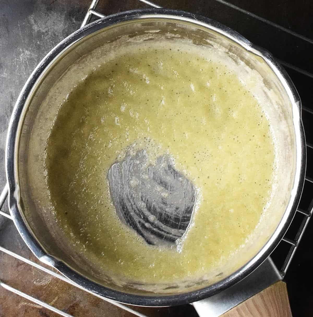 Roux mixture in metal saucepan.