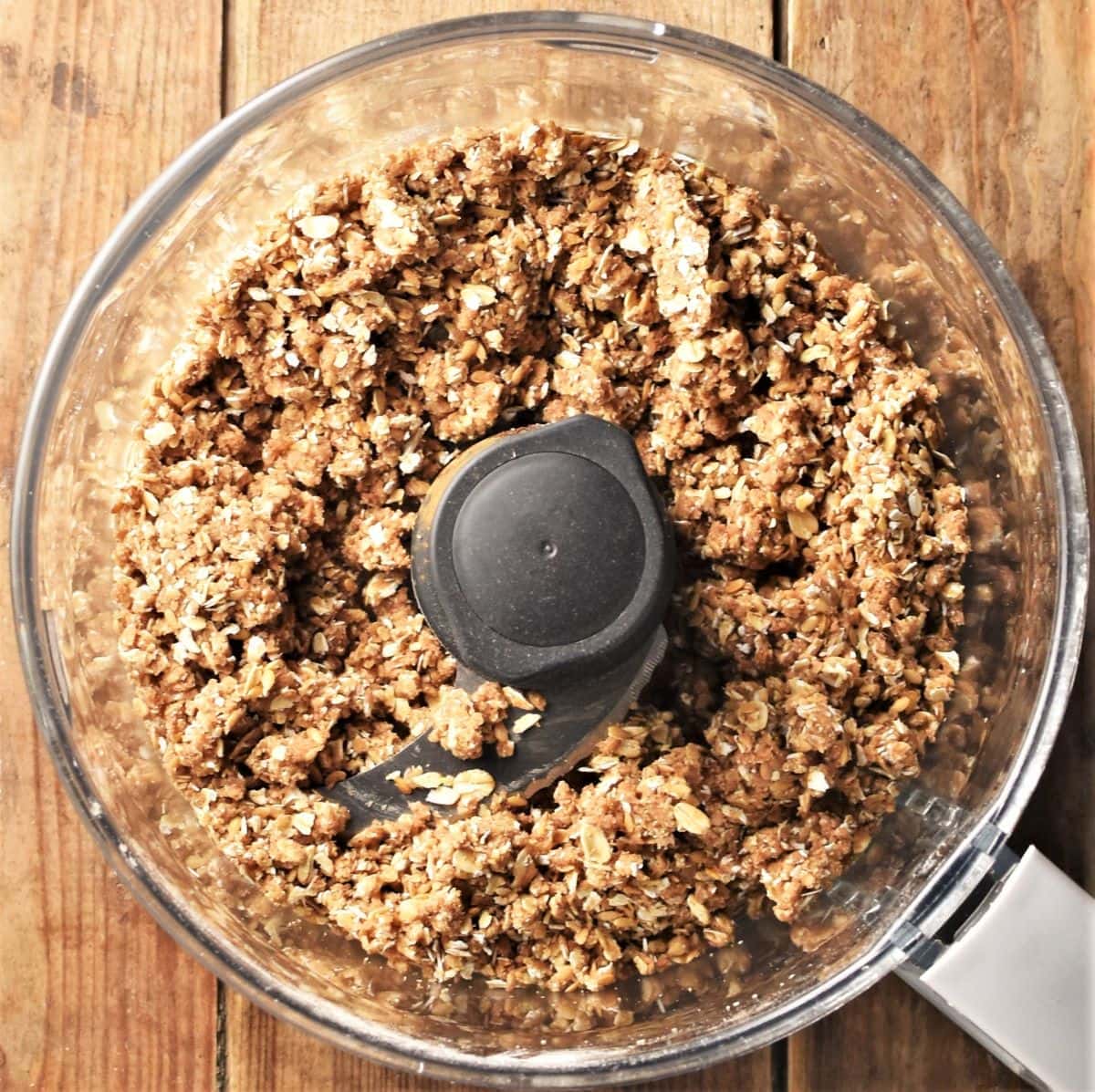 Crumble topping mixture in food processor bowl.