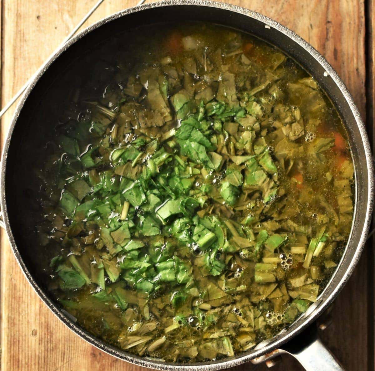 Sorrel soup in large pot.