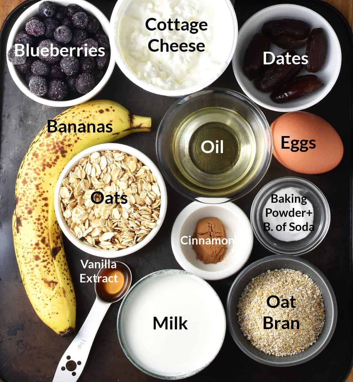 Ingredients for making banana and blueberry baked oatmeal in individual little bowls.