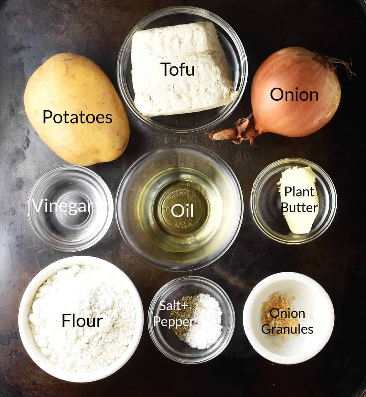 Top down view of vegan pierogi ingredients in individual dishes.