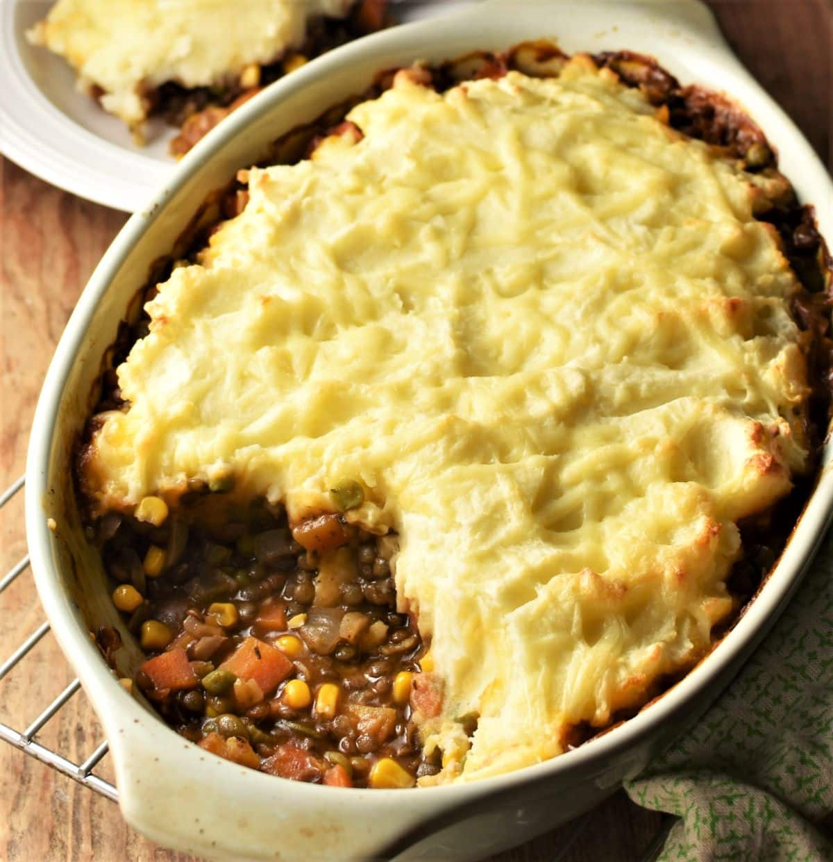 Lentil and vegetable shepherd's pie in oval dish.