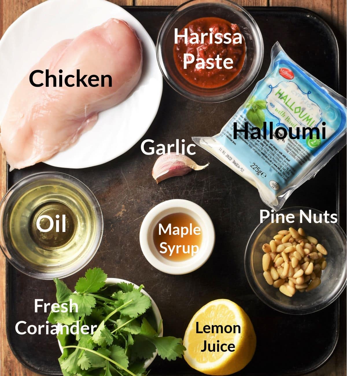 Ingredients for making hasselback chicken in individual dishes.