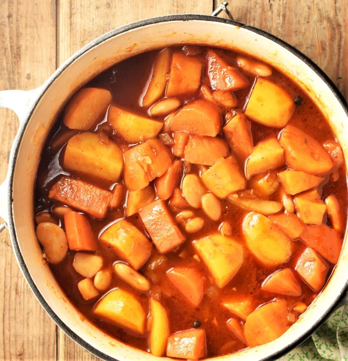 Cooking root vegetable casserole in large pot.