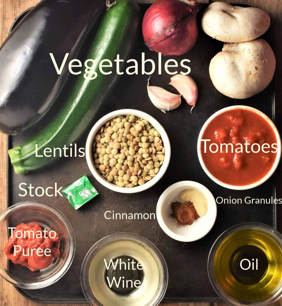 Ingredients for making vegetarian moussaka filling in individual dishes.