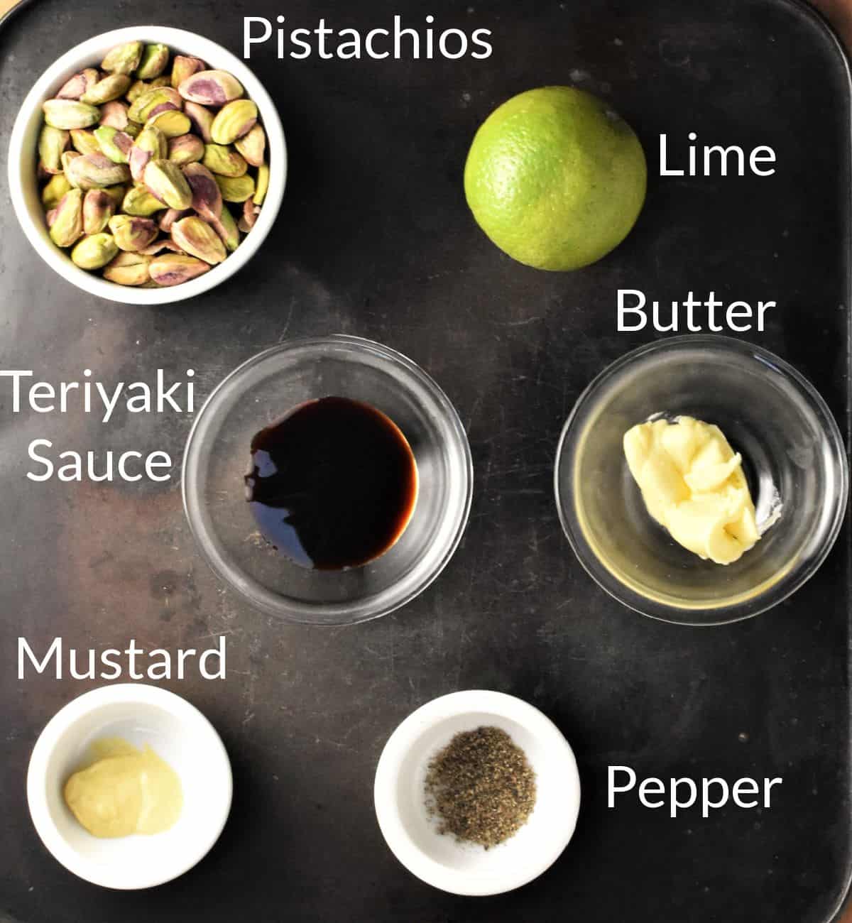 Ingredients for making pistachio crusted salmon topping mixture in individual dishes.