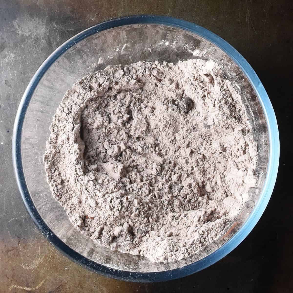 Dry pancake mixture in glass bowl.