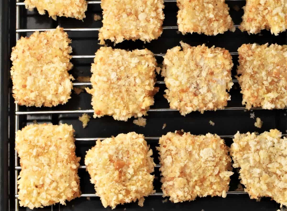 Breaded fish nuggets on top of rack.