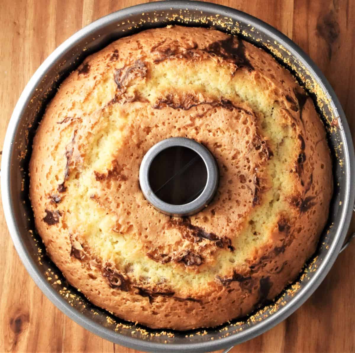 Top down view of baked babka in large ring pan.