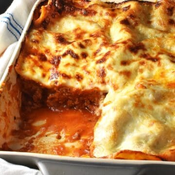 Side view of turkey lasagna in rectangular dish.