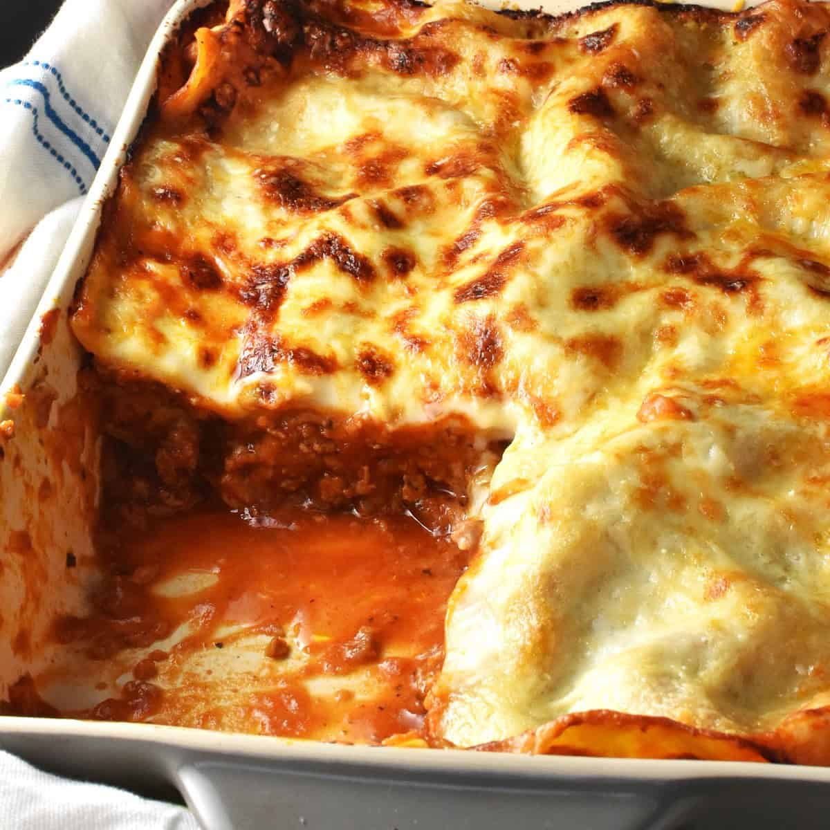 Side view of turkey lasagna in rectangular dish.