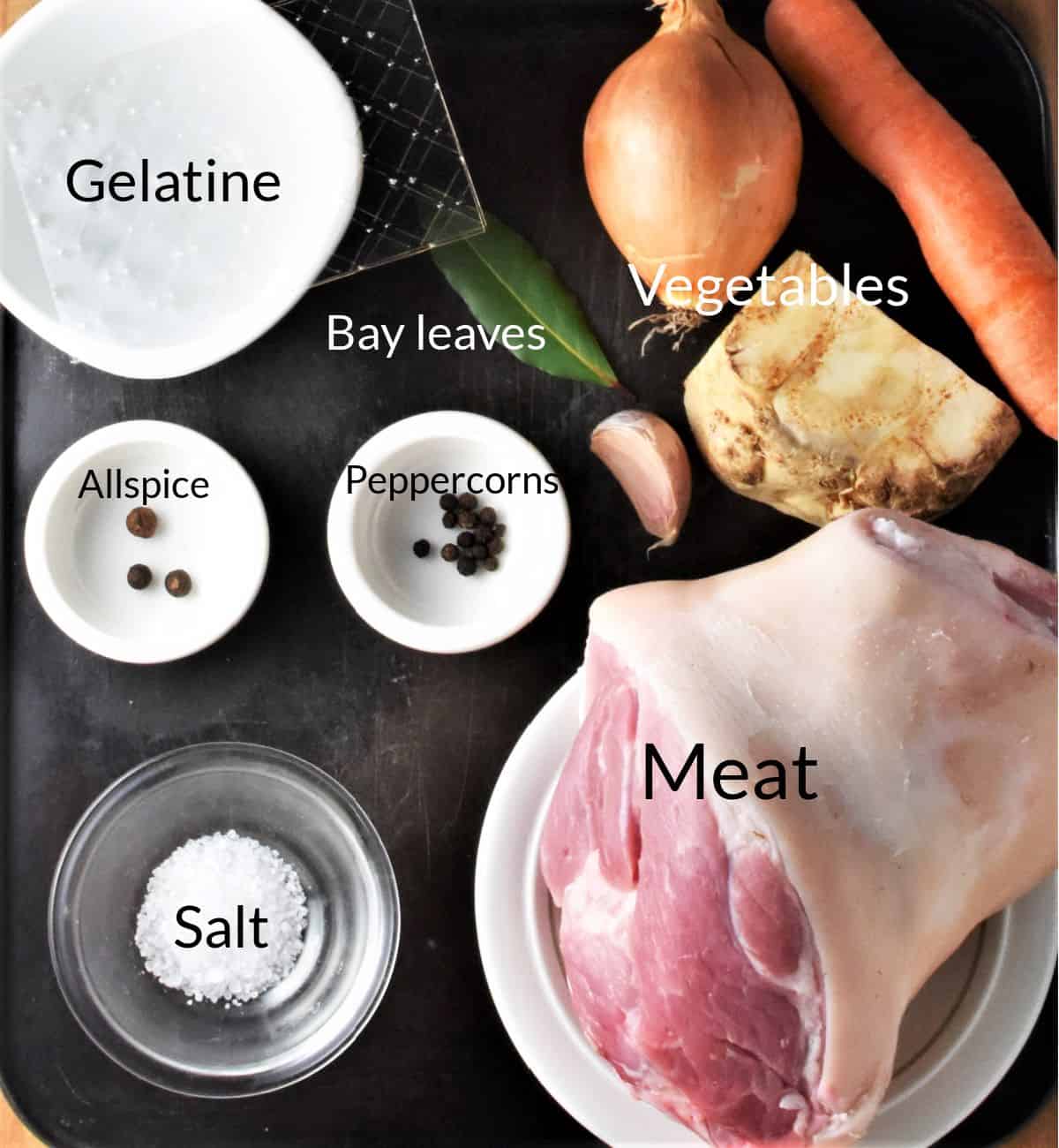 Ingredients for making Polish meat jelly in individual dishes.