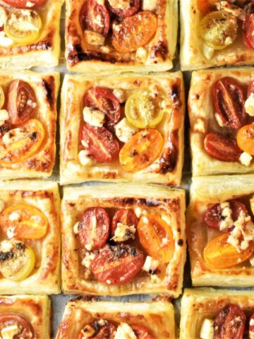 Top down view of tomato tartlets arranged close together.