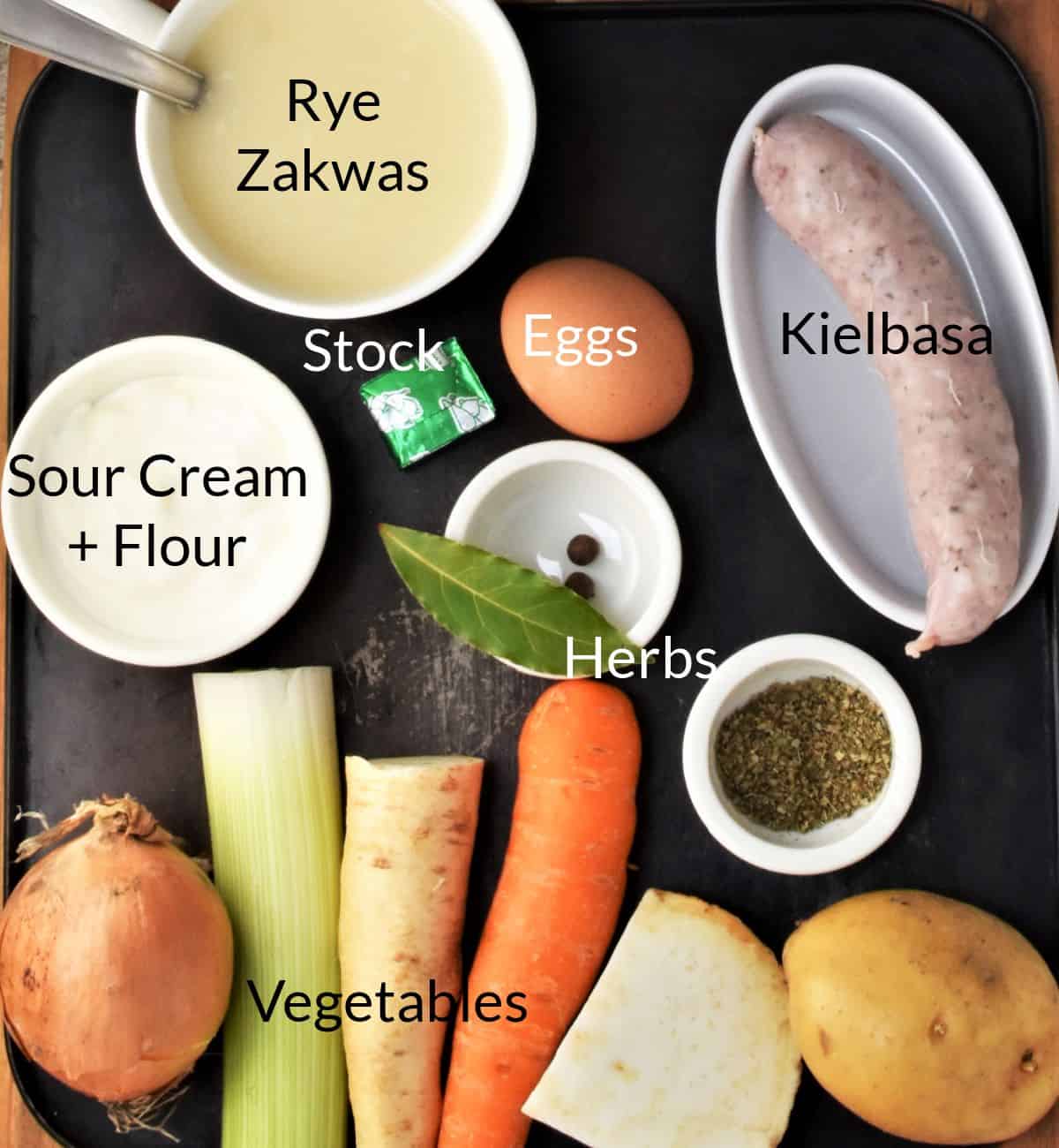 Ingredients for making zurek recipe in individual dishes.