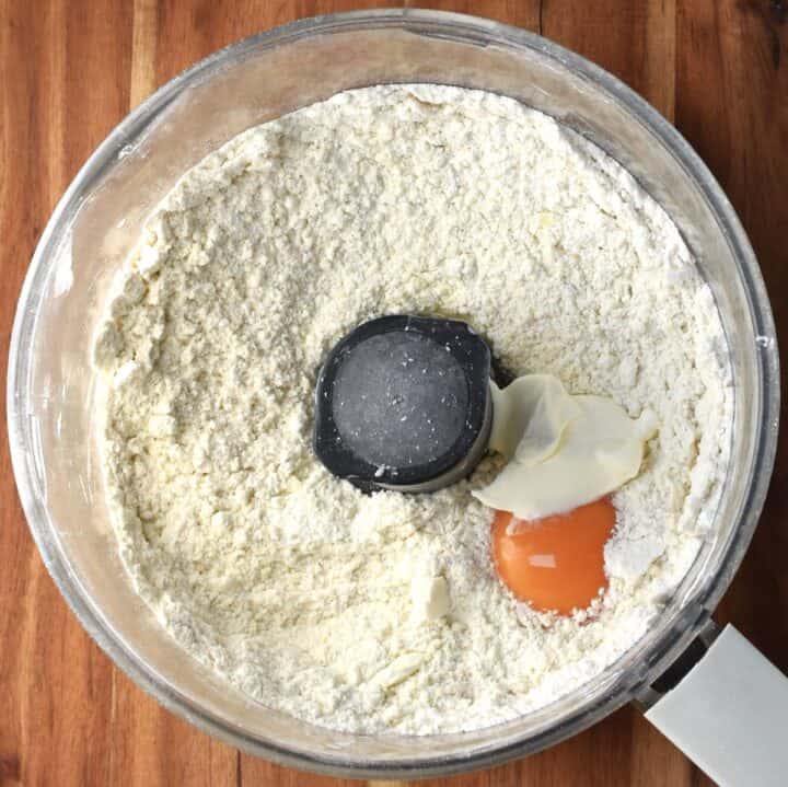 Flour mixture, egg yolk and yogurt in food processor.
