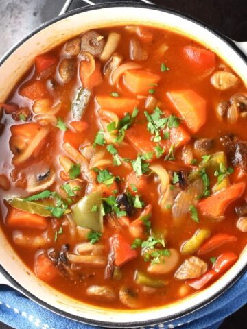 Top down view of vegetarian goulash in pot.