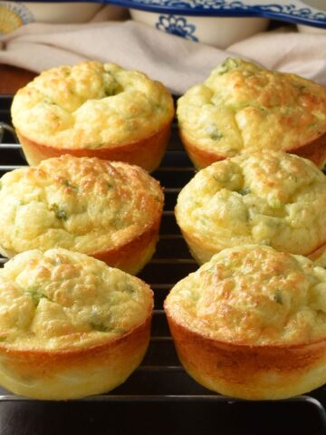 Side view of 6 cottage cheese egg muffins on rack.
