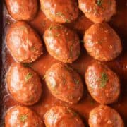 Top down view of lazy cabbage rolls in tomato sauce with dill.